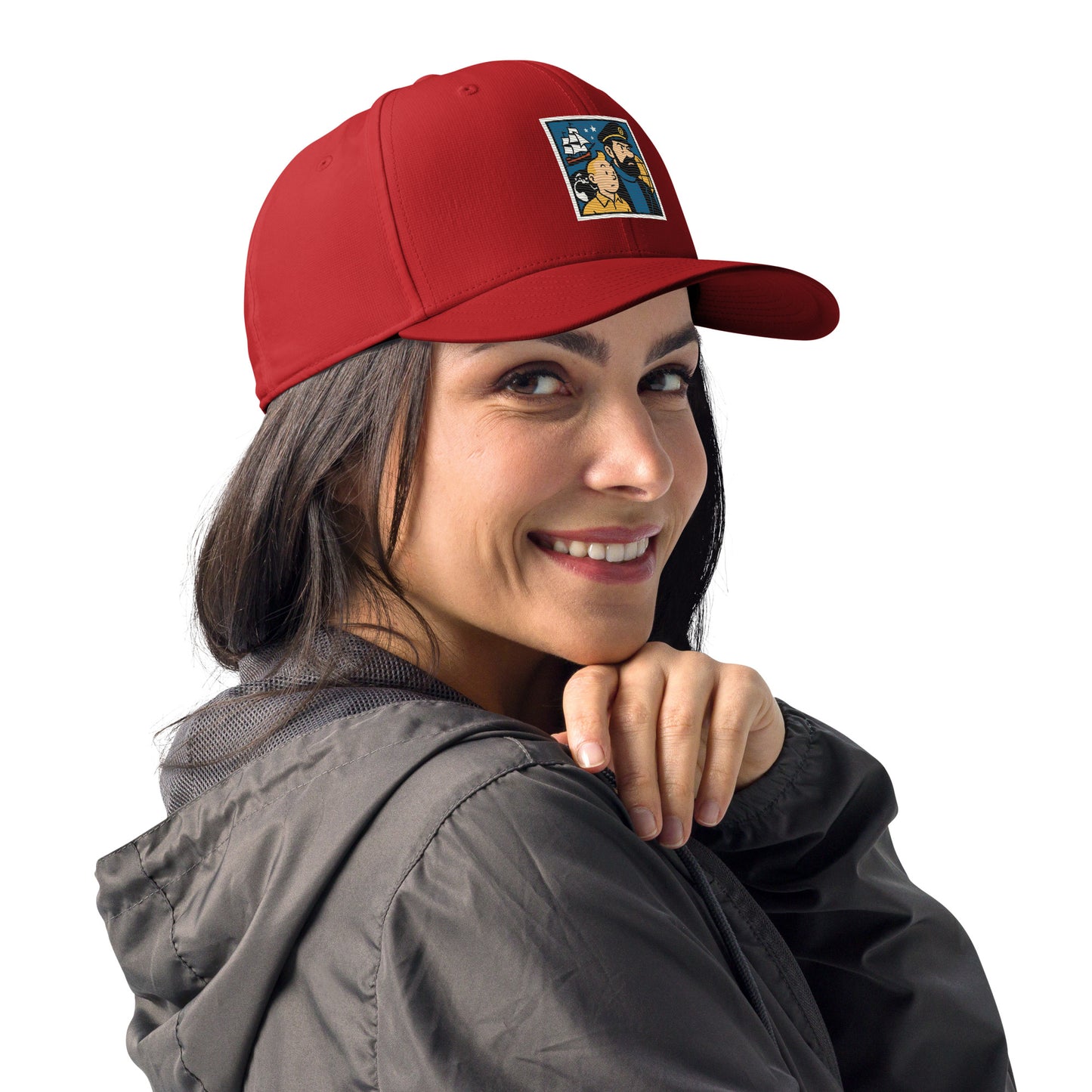 Woman wearing a red cap with a logo on a white background
