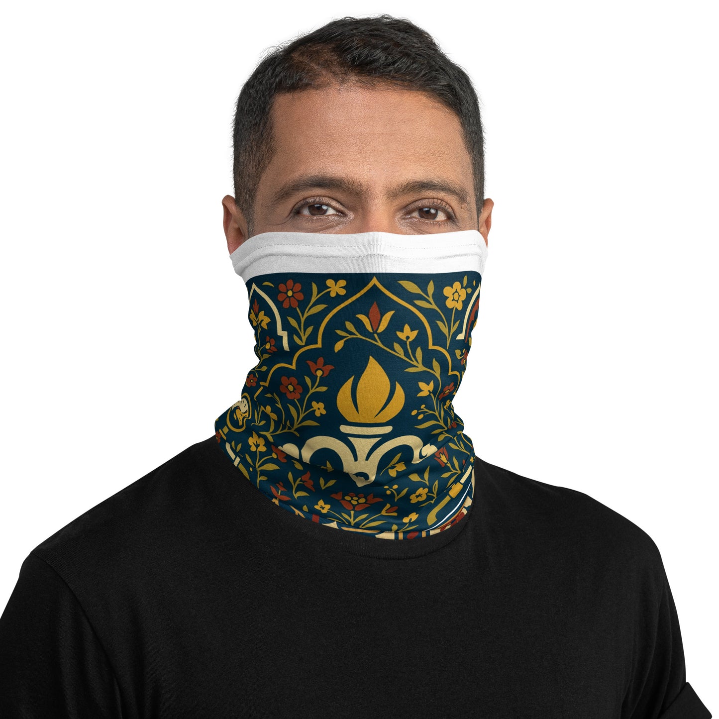 Person wearing a decorative neck gaiter with floral and flame design on a white background
