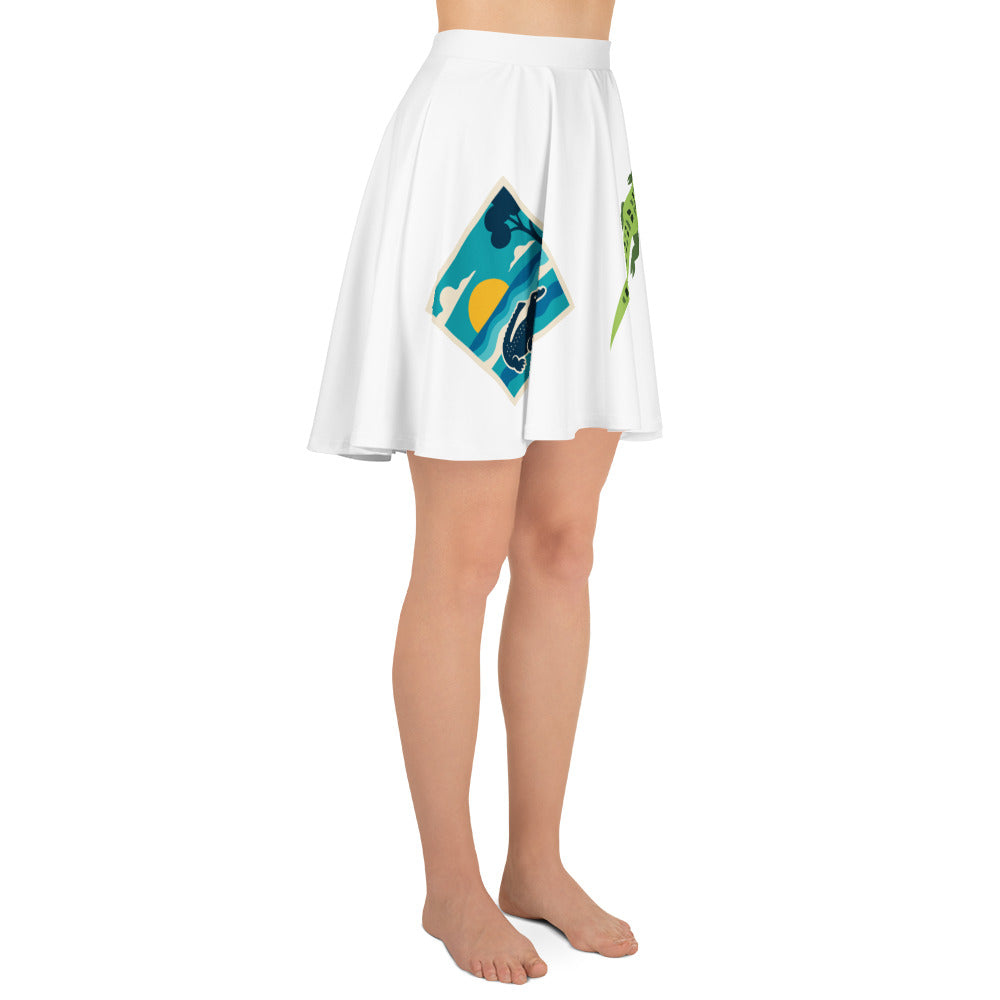 White skirt with colorful diamond design worn by a person on a white background