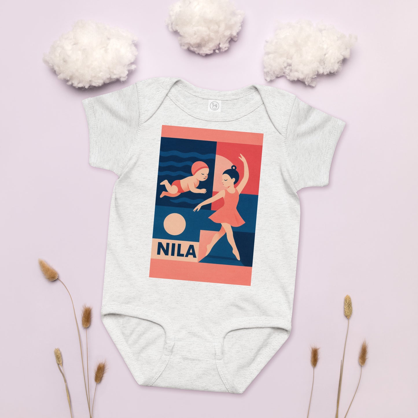 Baby onesie with a graphic design on a light pink background