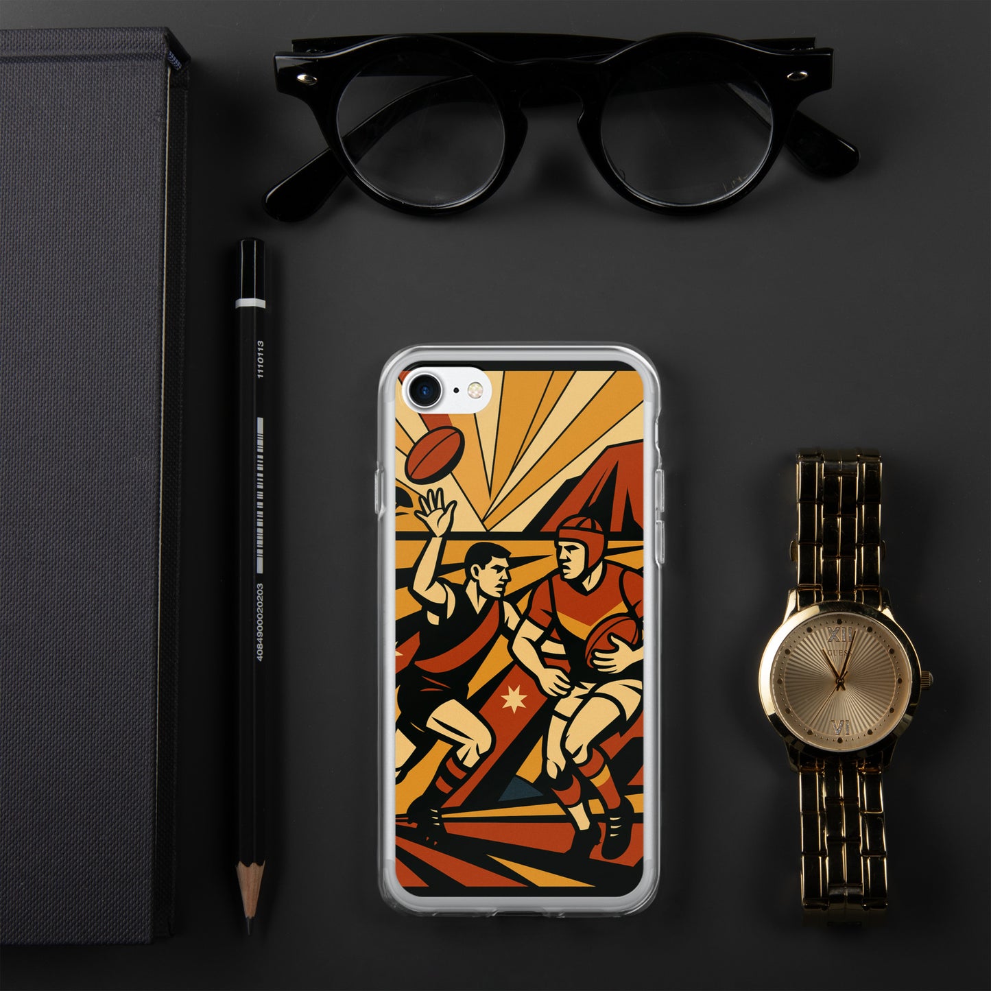 Phone case with sports design on a dark surface with glasses, pen, and watch.