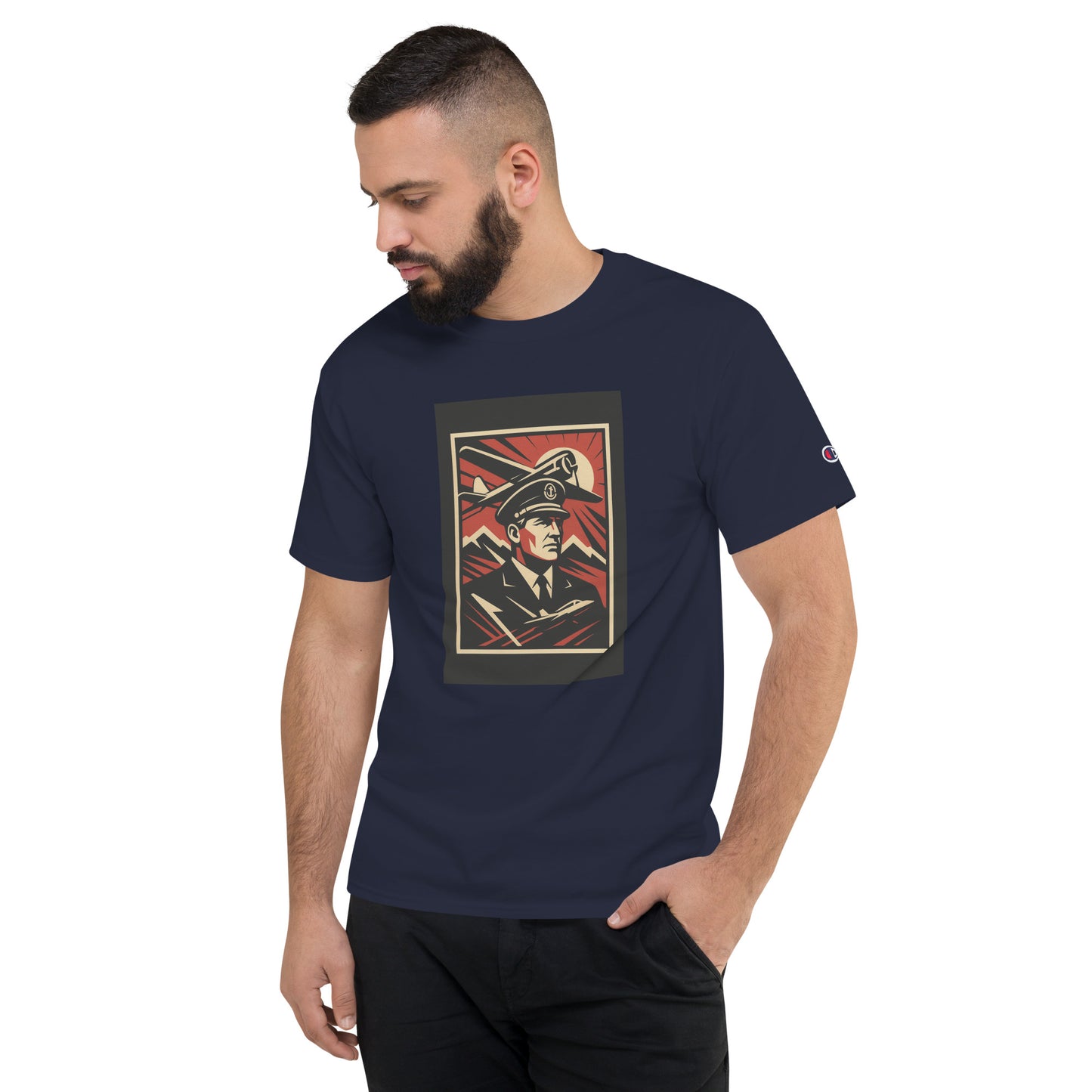 Man wearing a navy blue t-shirt with a graphic design on a white background