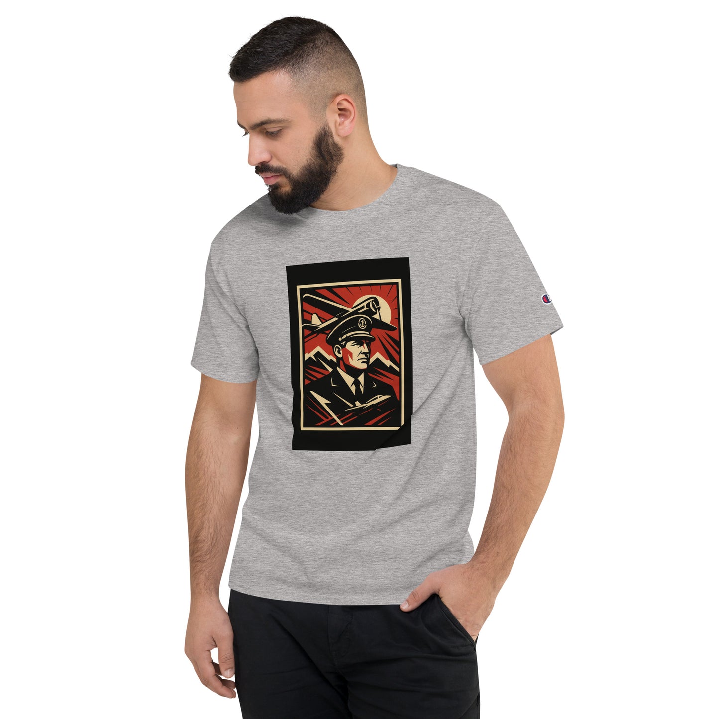 Man wearing a gray t-shirt with a graphic design on a white background