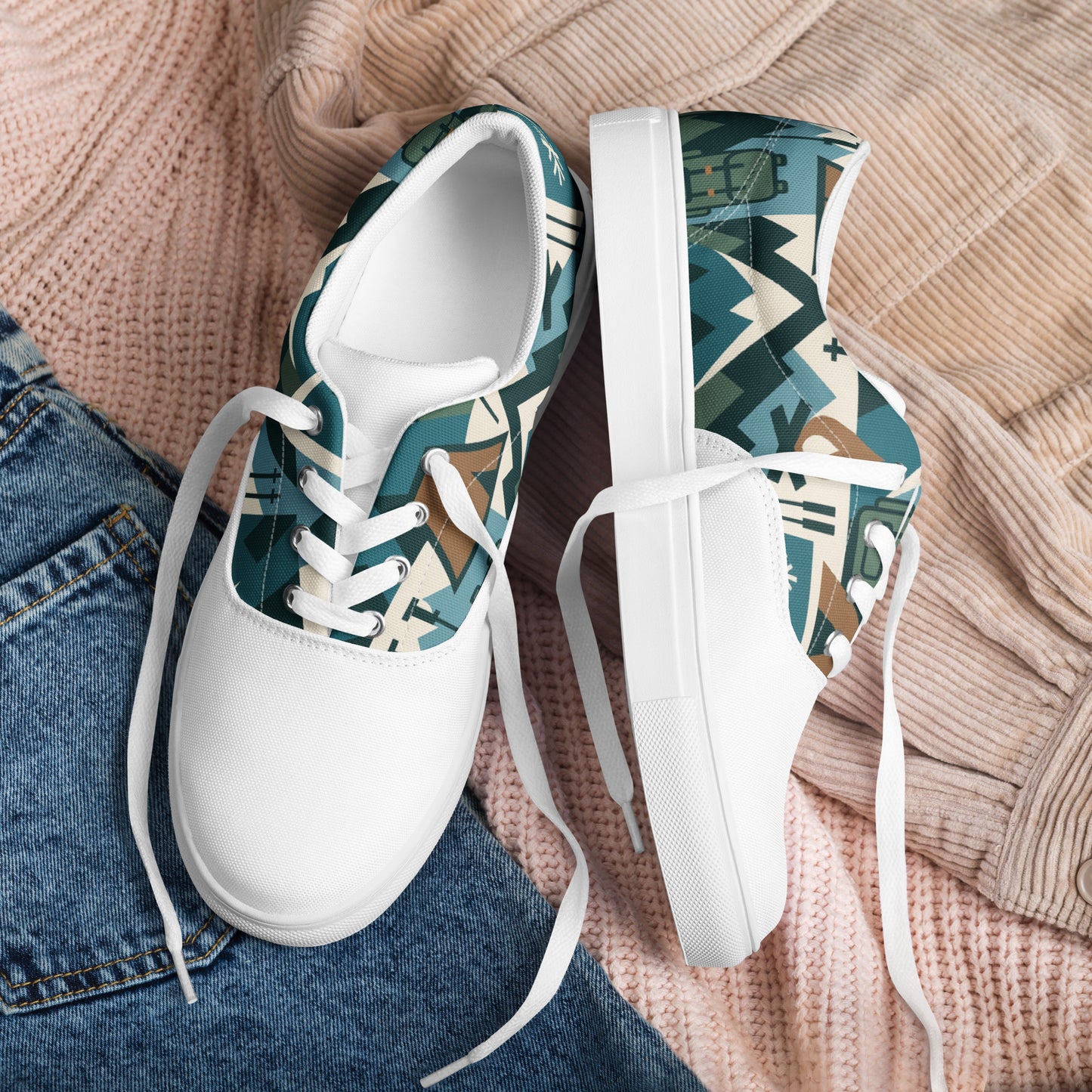 White sneakers with a geometric pattern on a textured fabric background