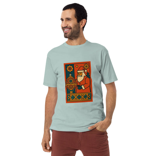 Man wearing a light blue t-shirt with a colorful graphic design on a white background