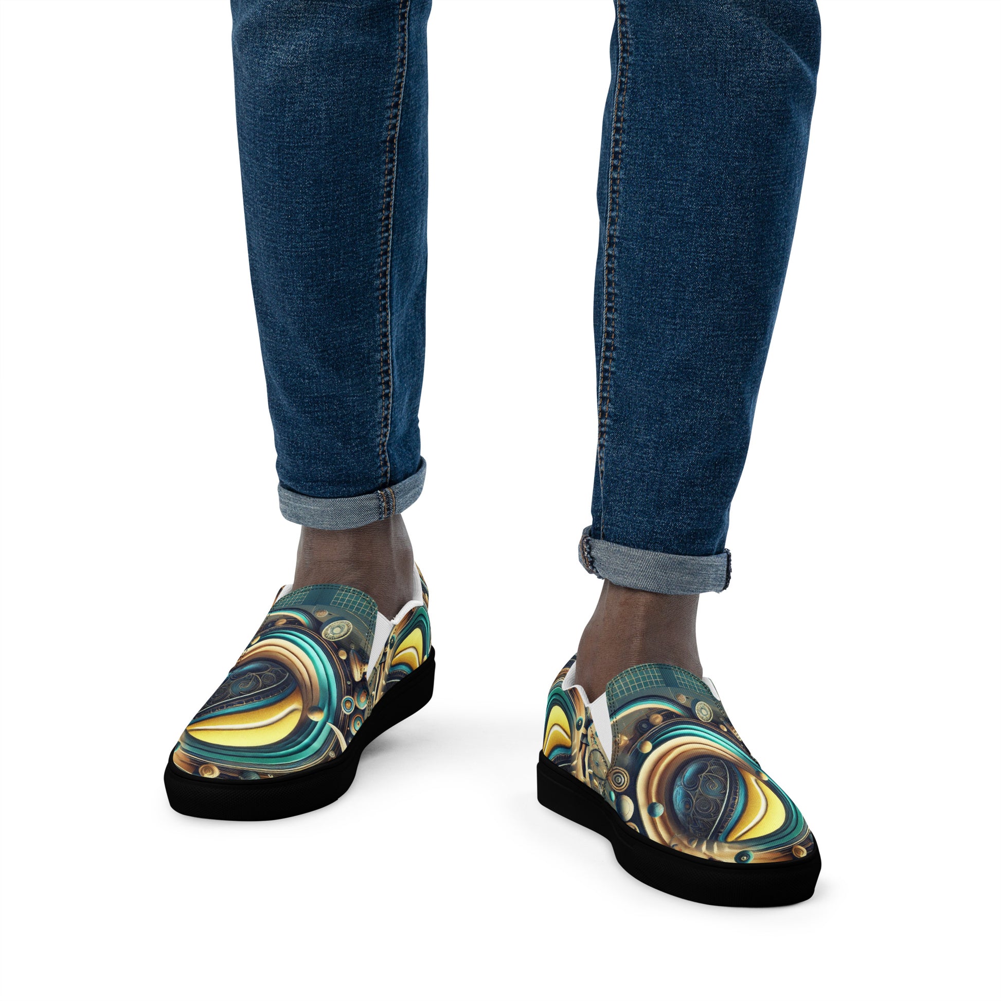Colorful abstract-patterned shoes worn with blue jeans on a white background