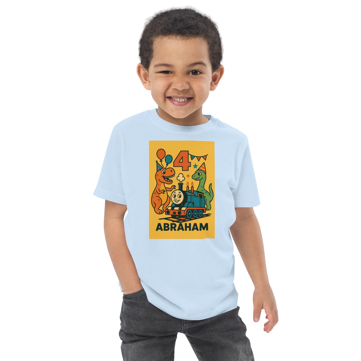 Child wearing a light blue t-shirt with a colorful graphic and text on a white background