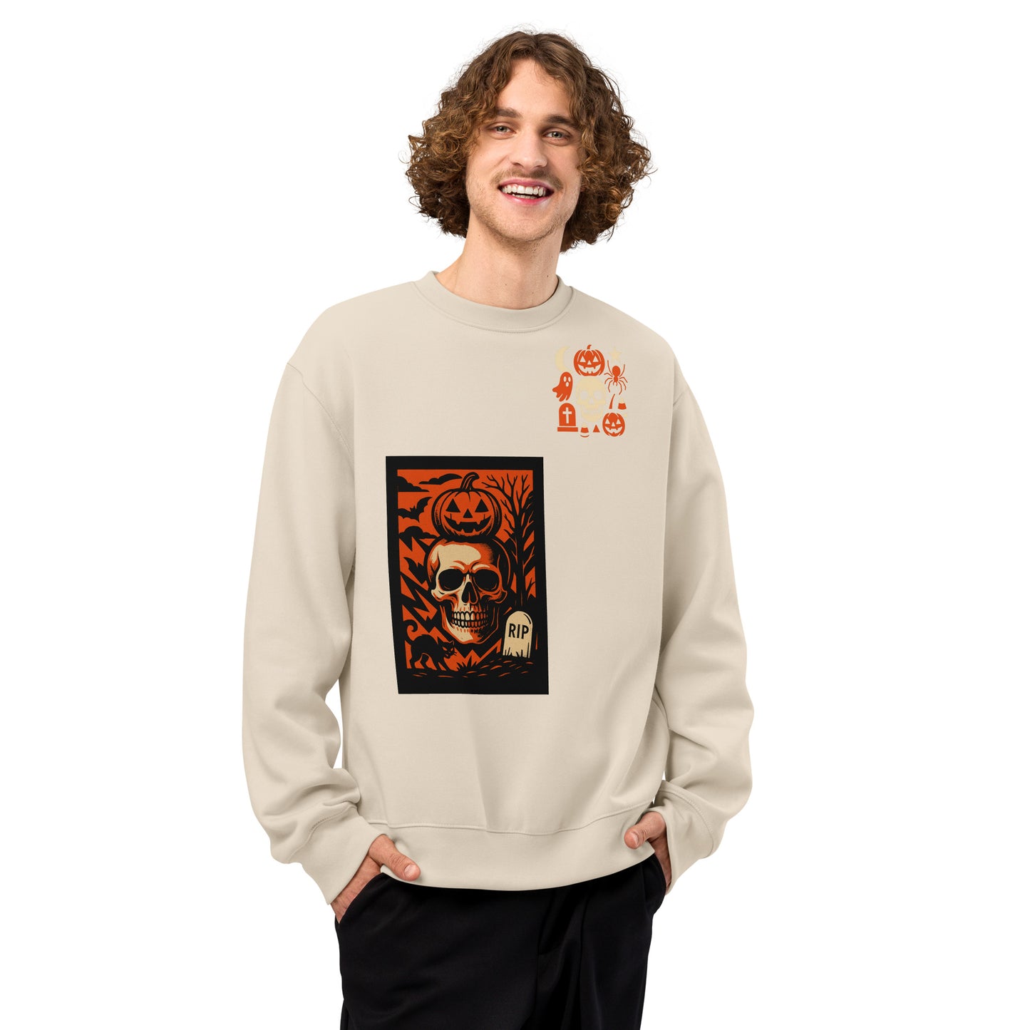 Person wearing a beige sweatshirt with Halloween-themed design on a white background