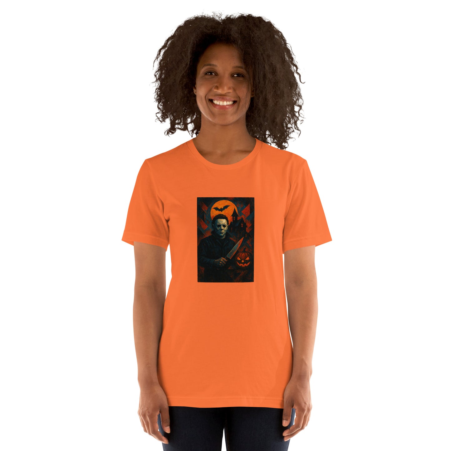 Person wearing an orange t-shirt with a graphic design on a white background
