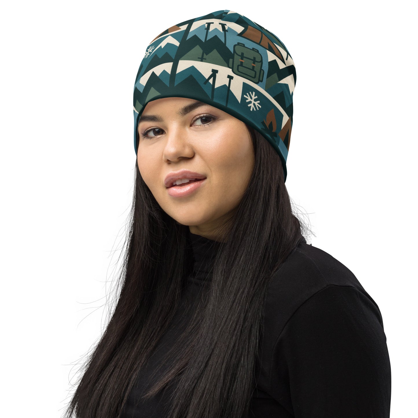 Woman wearing a patterned beanie on a white background