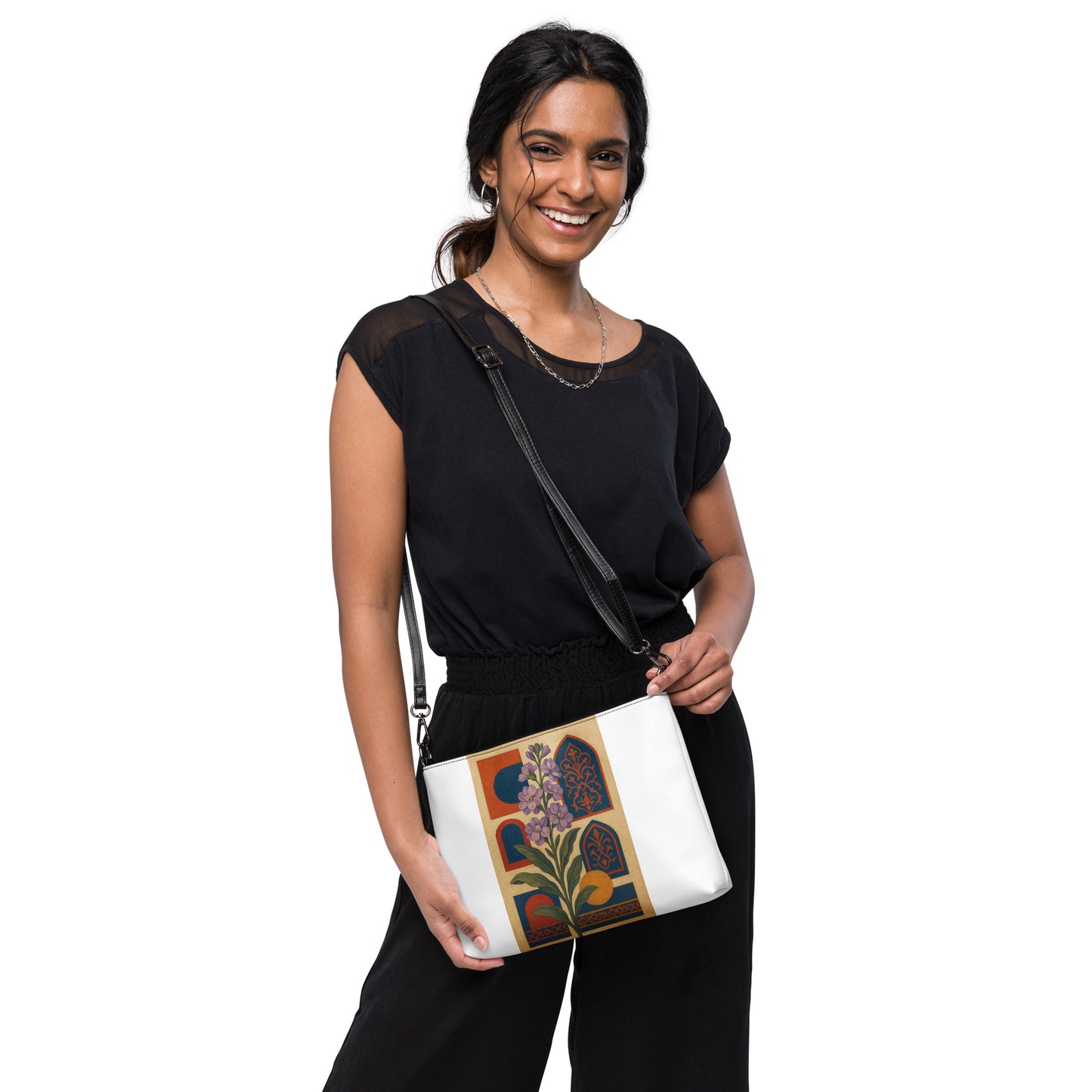 Woman holding a white bag with floral design on a white background