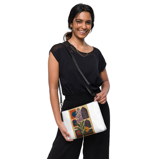 Woman holding a white bag with floral design on a white background