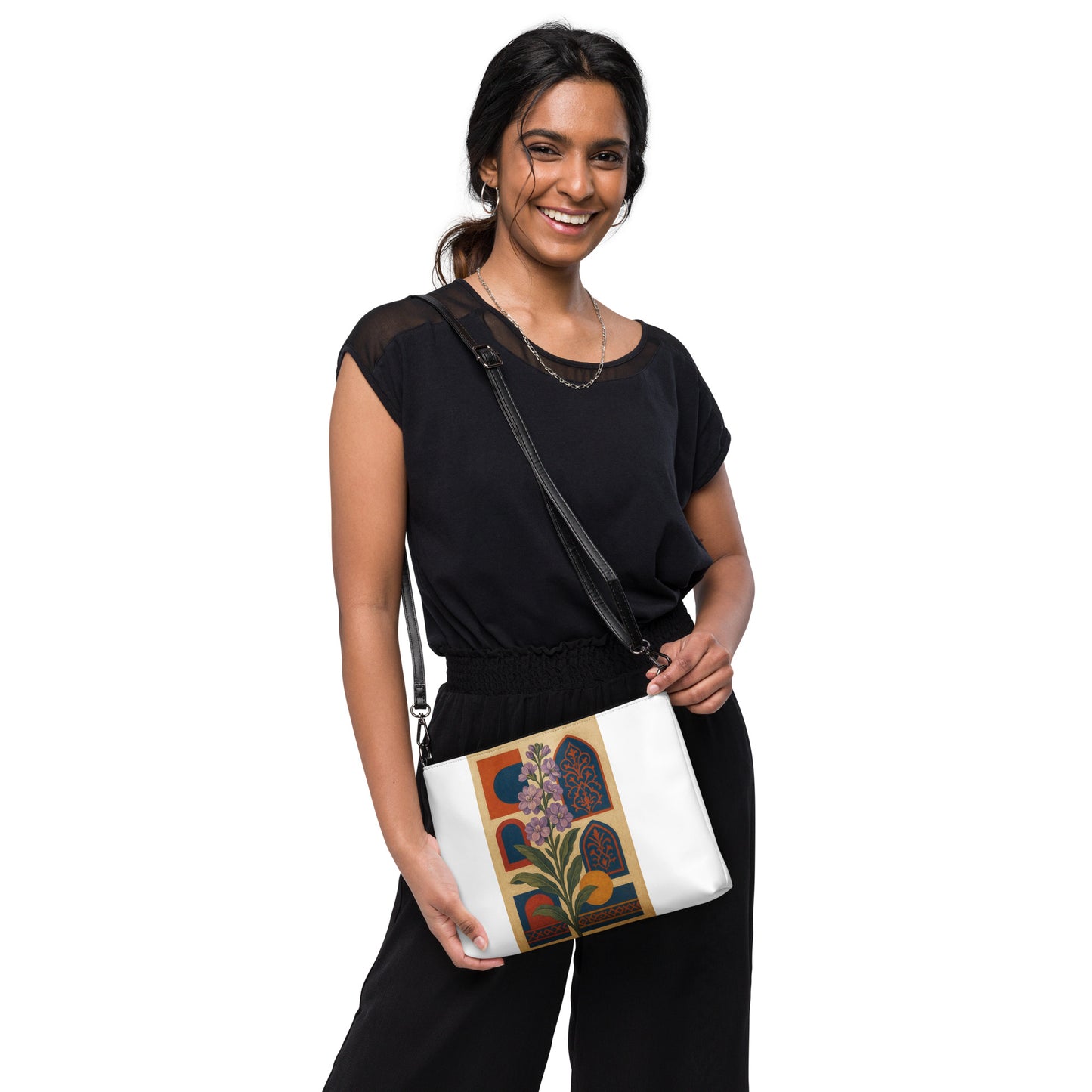 Woman holding a white bag with floral design on a white background