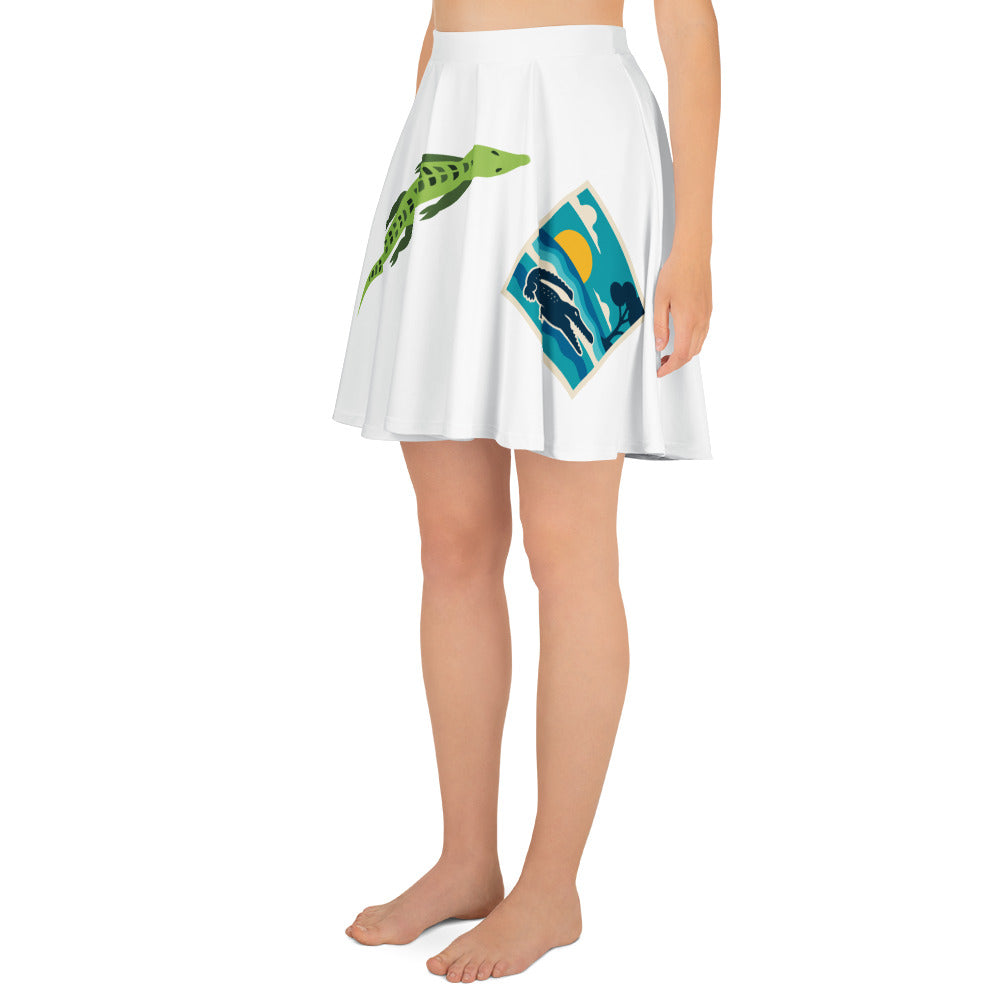 White skirt with animal prints worn by a person on a white background