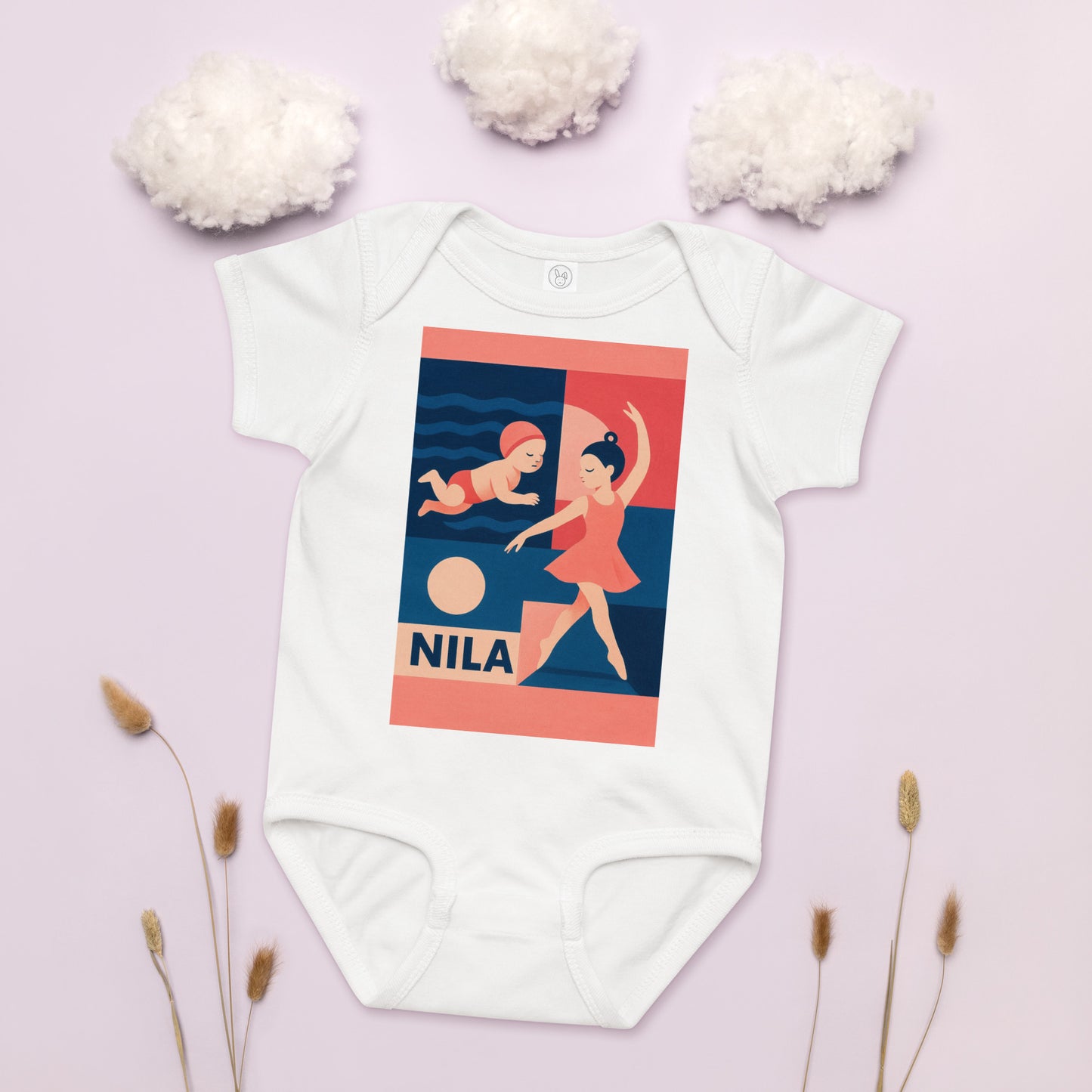 White baby onesie with a colorful graphic design on a light pink background
