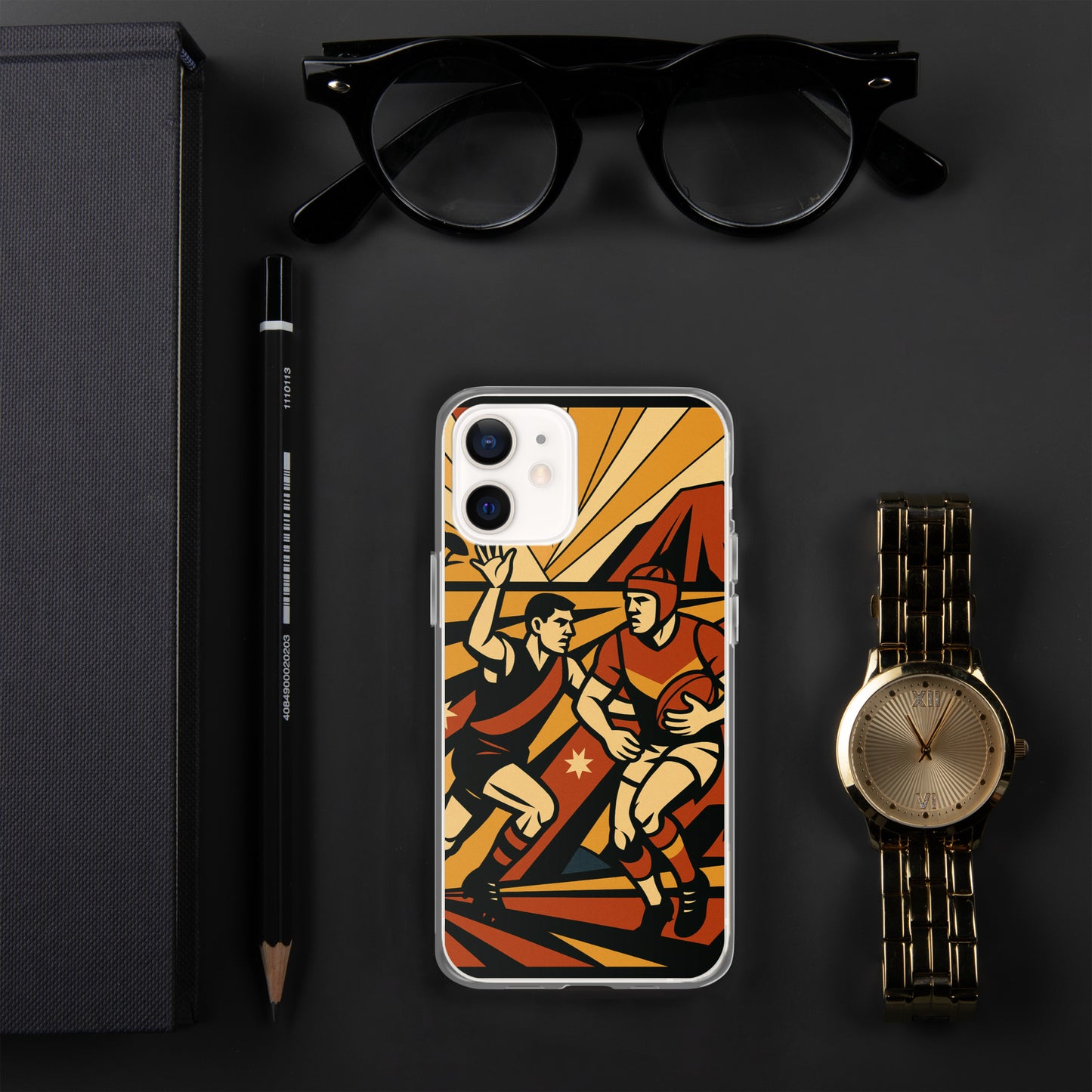 Phone case with sports design on a dark surface with glasses, pen, and watch.