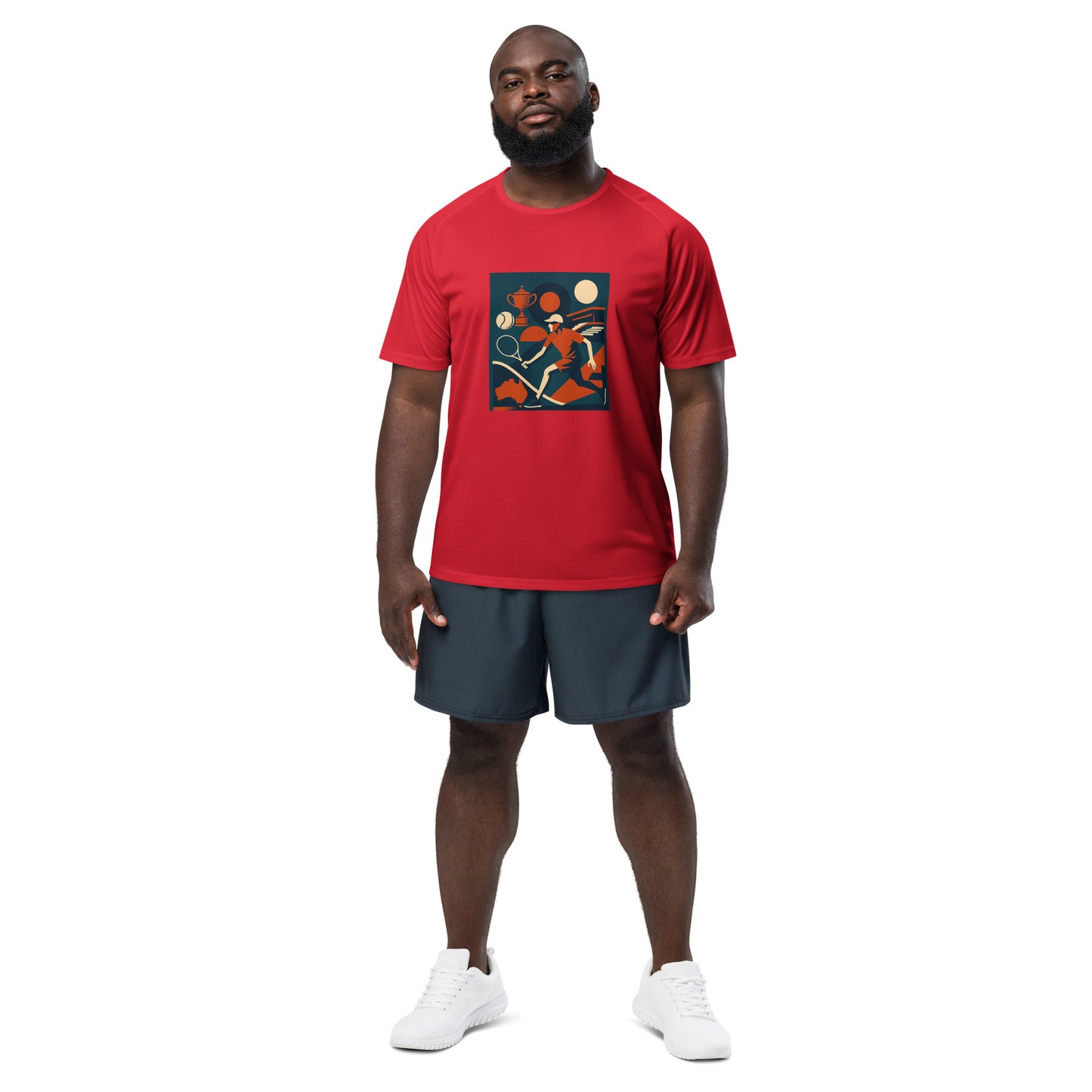 Man wearing a red tennis t-shirt with a graphic design and dark shorts on a white background