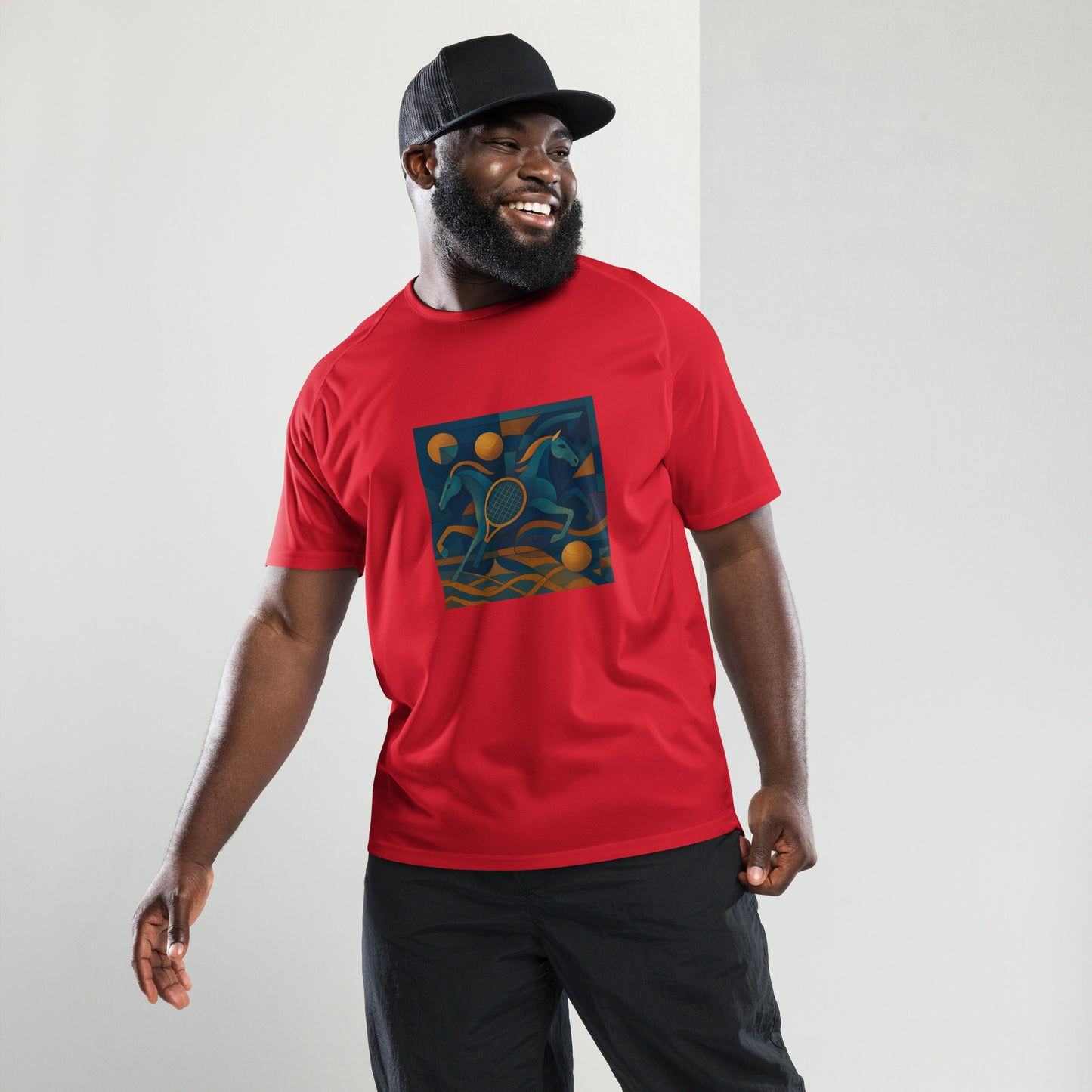 Man wearing a red t-shirt with a graphic design on a plain background