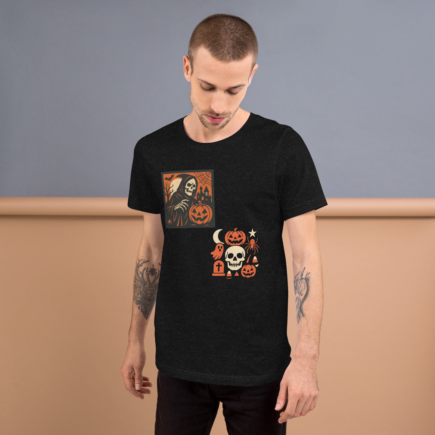 Man wearing a black t-shirt with Halloween-themed graphics against a plain background