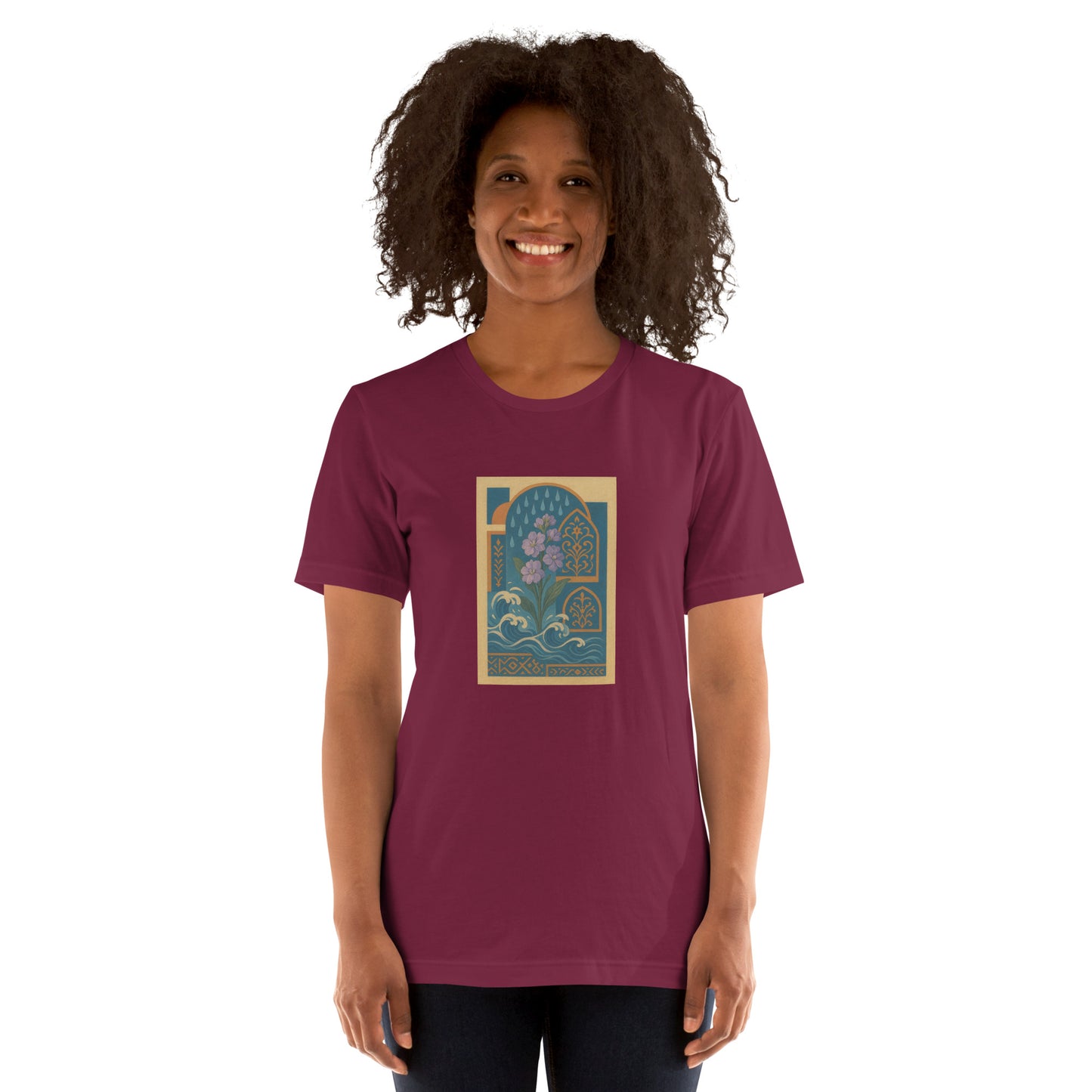 Woman wearing a maroon t-shirt with a graphic design on a white background