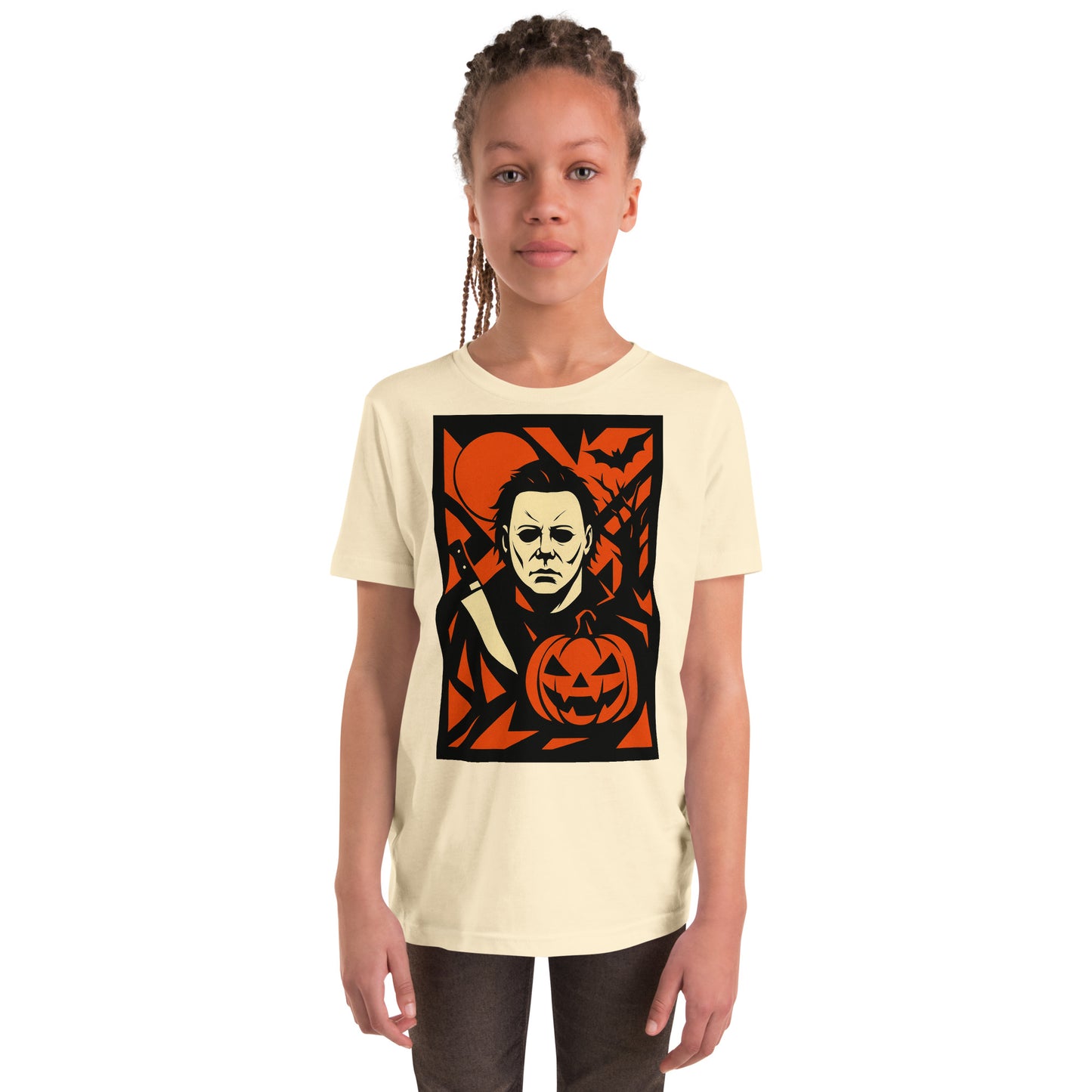 HALLOWEEN Child wearing a t-shirt with a graphic design of a character and pumpkin on a white background